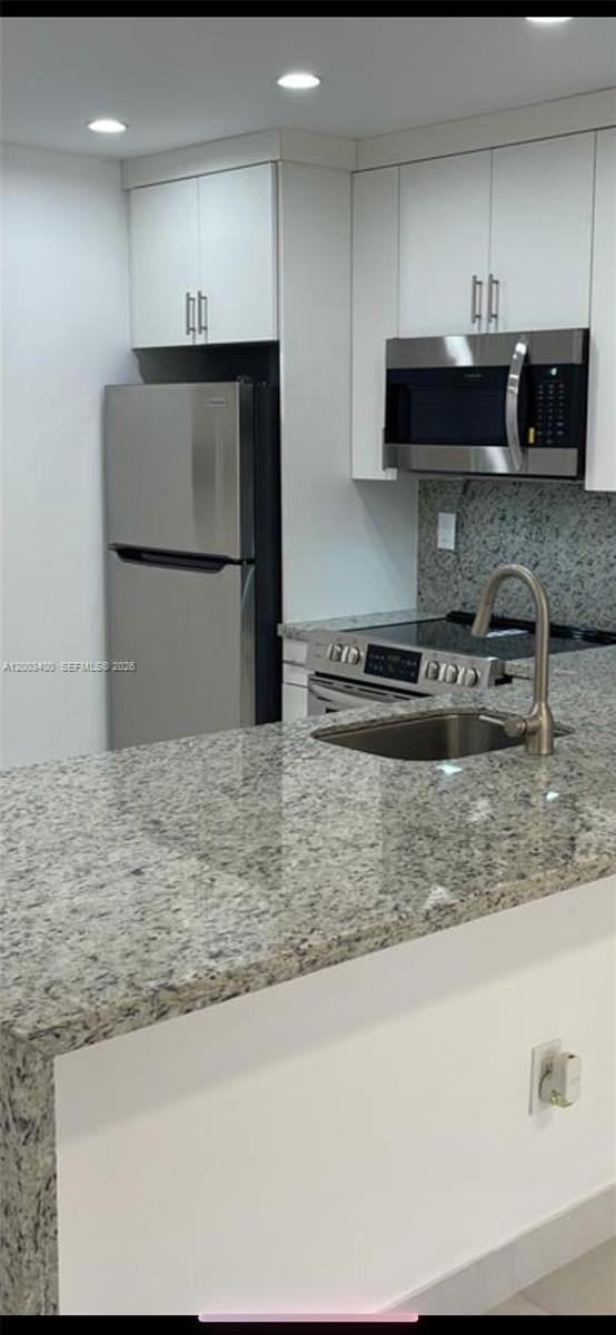 7732 Camino Real #F-318