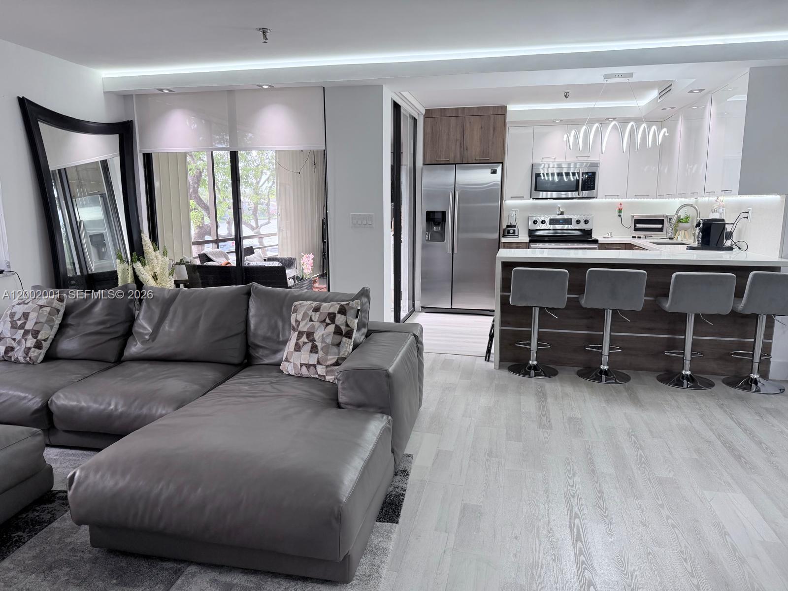 671 NE 195th St #208E