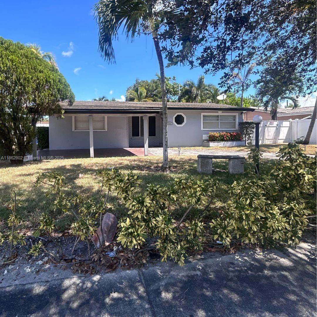 221 NE 24th St
