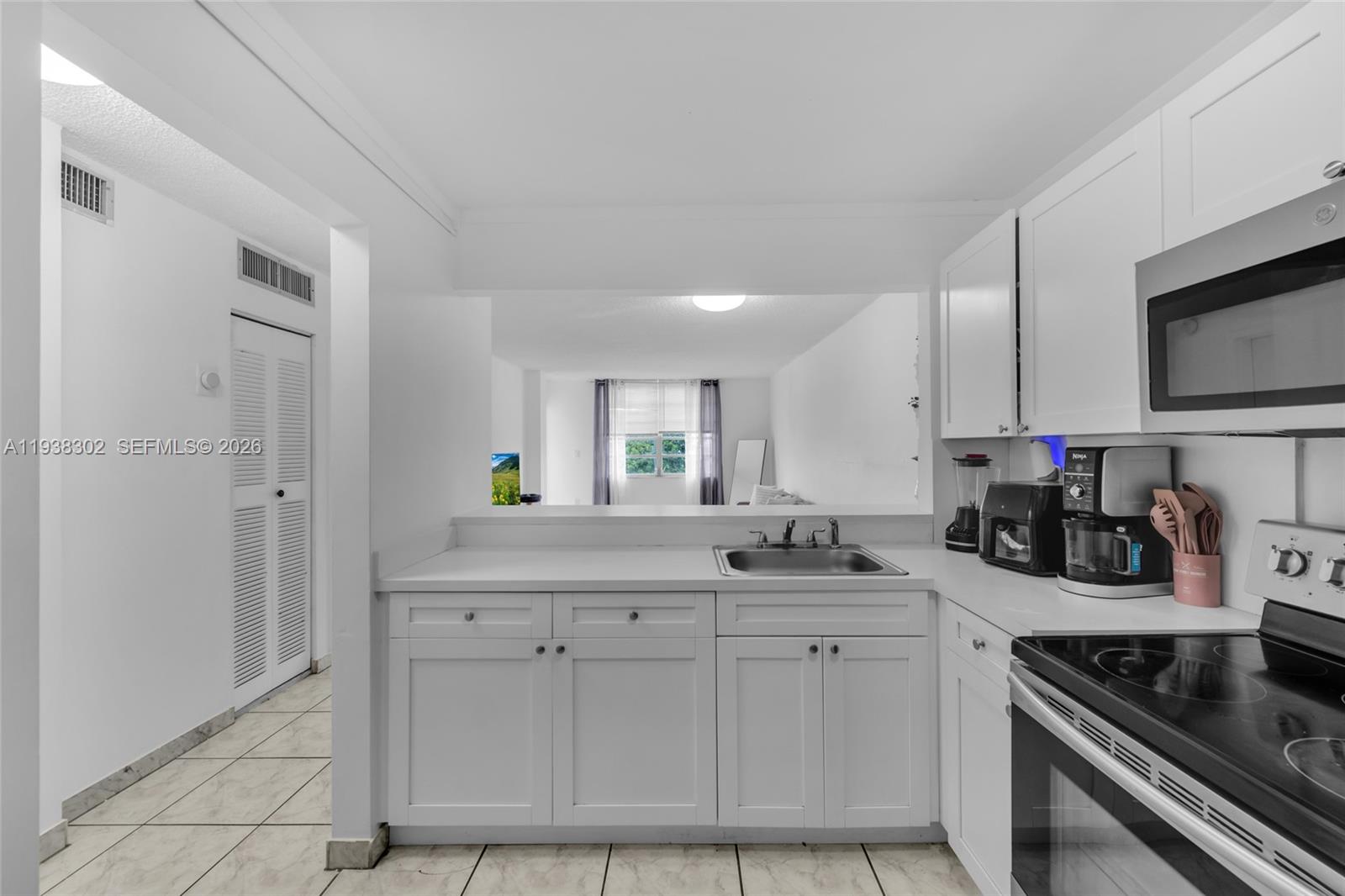 1250 NE 125th St #311C North Miami, FL 33161