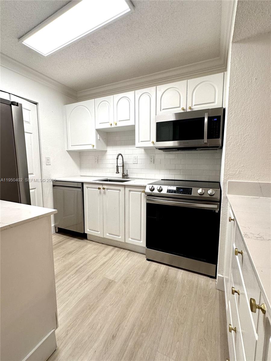 10795 SW 108th Ave #304