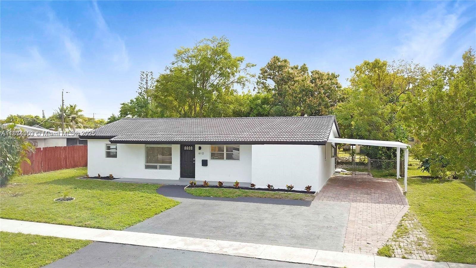 610 NW 38th Ct