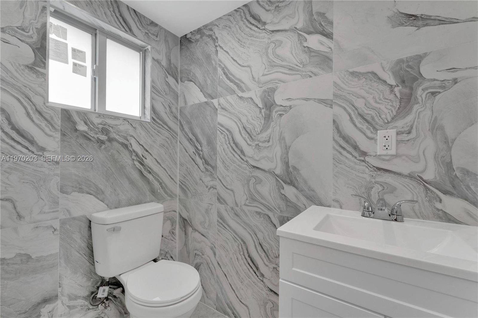 521 NW 33rd Ave Miami, FL 33125