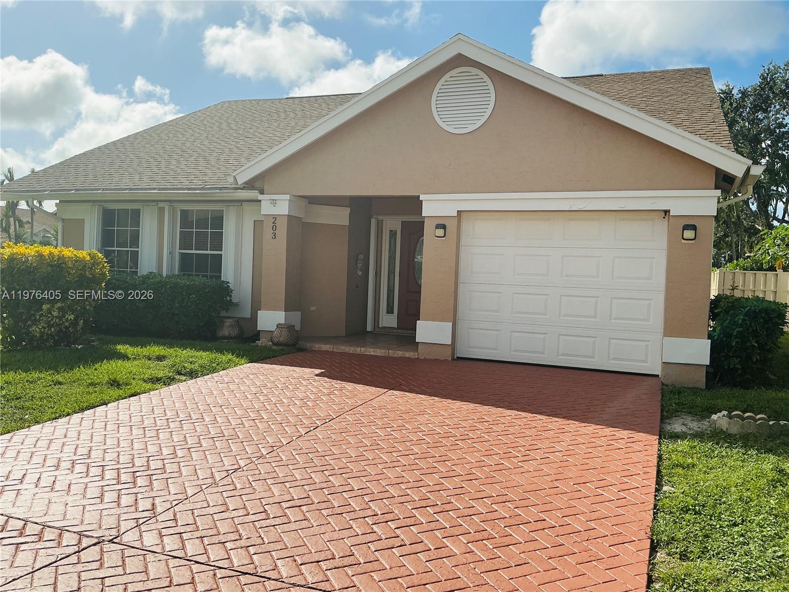 203 N Moccasin Trl N Jupiter, FL 33458