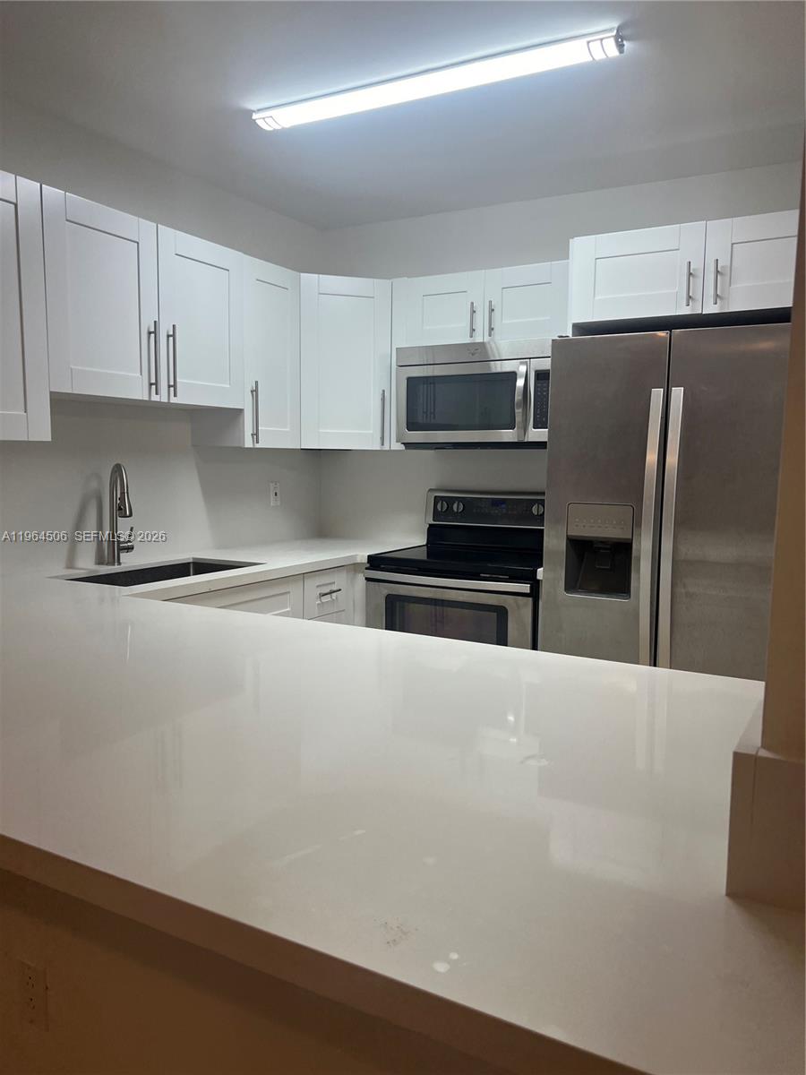 13820 SW 112th St #108