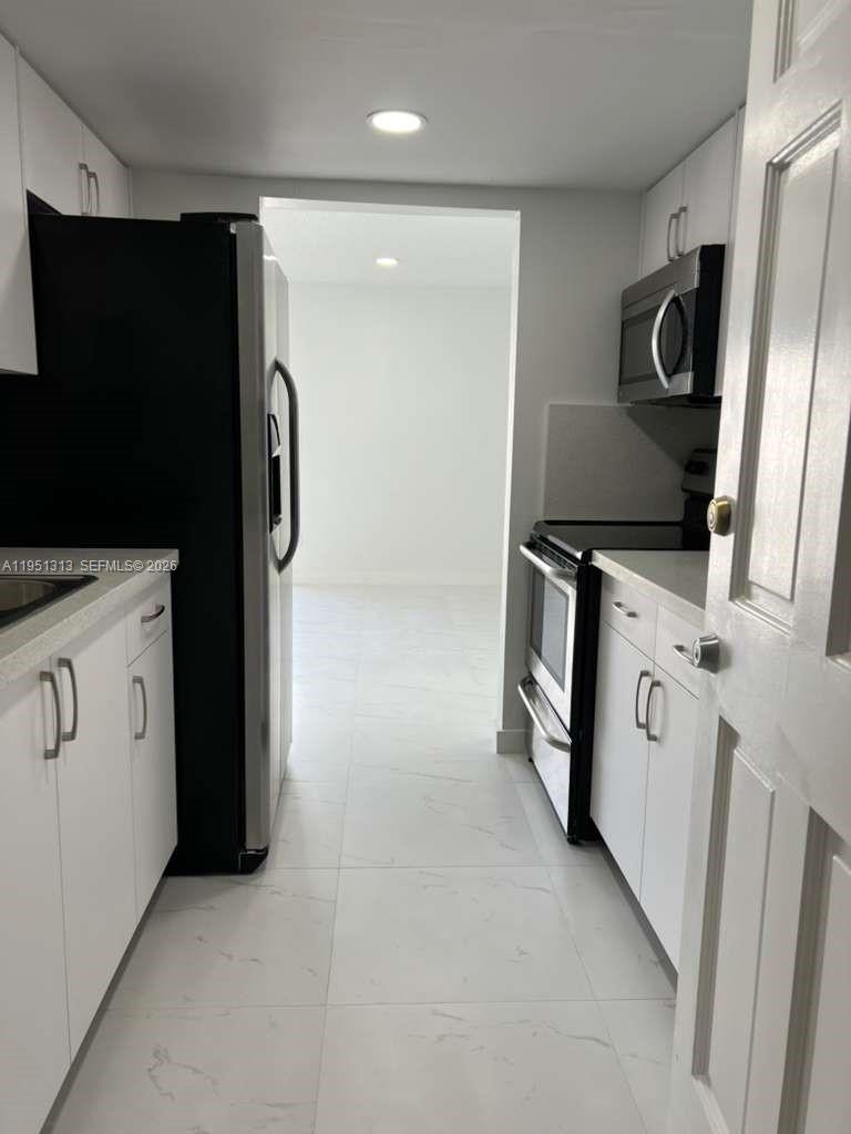 309 S Royal Poinciana Blvd #304 Miami Springs, FL 33166