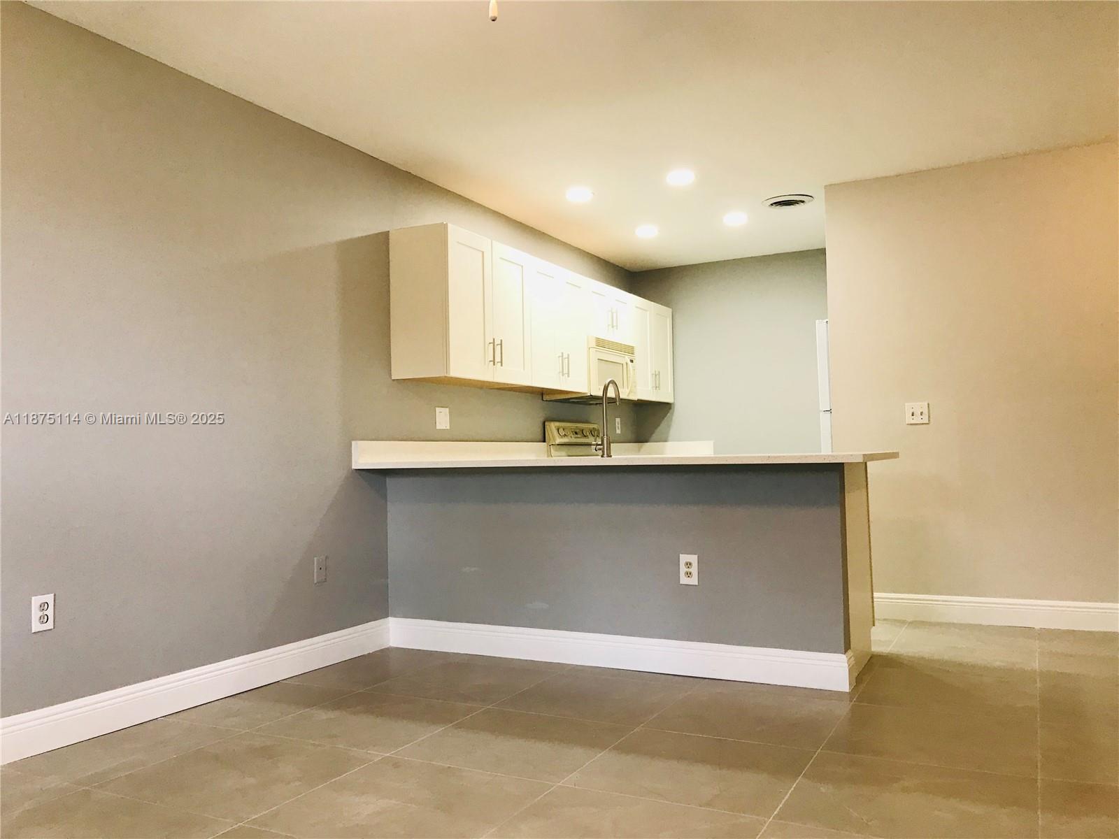565 NW 100th Pl #203