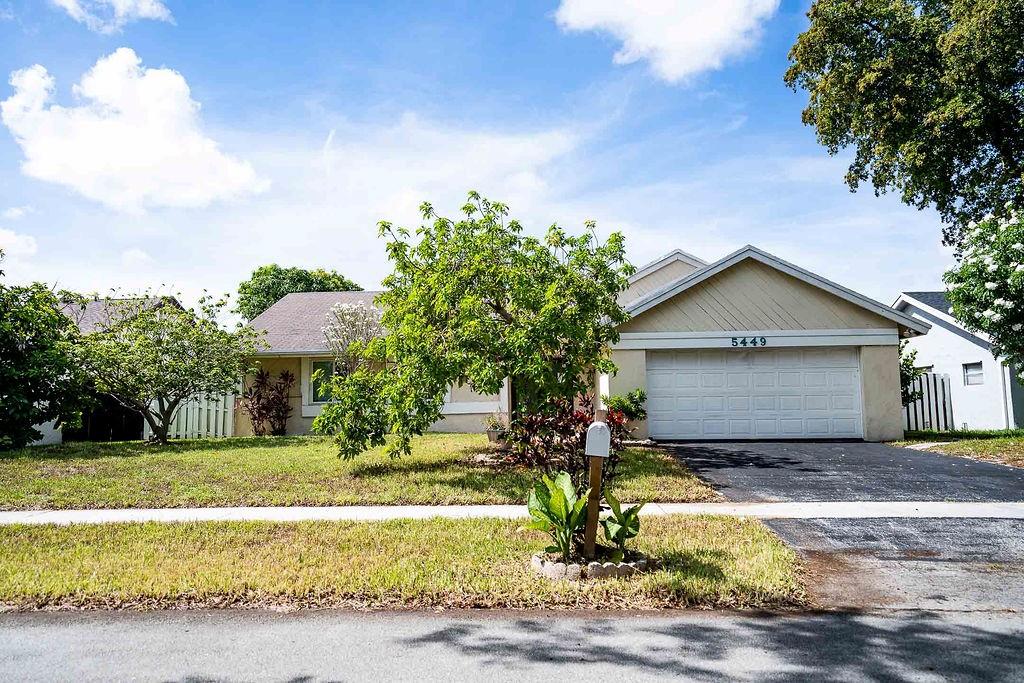 5449 NW 56th Ct
