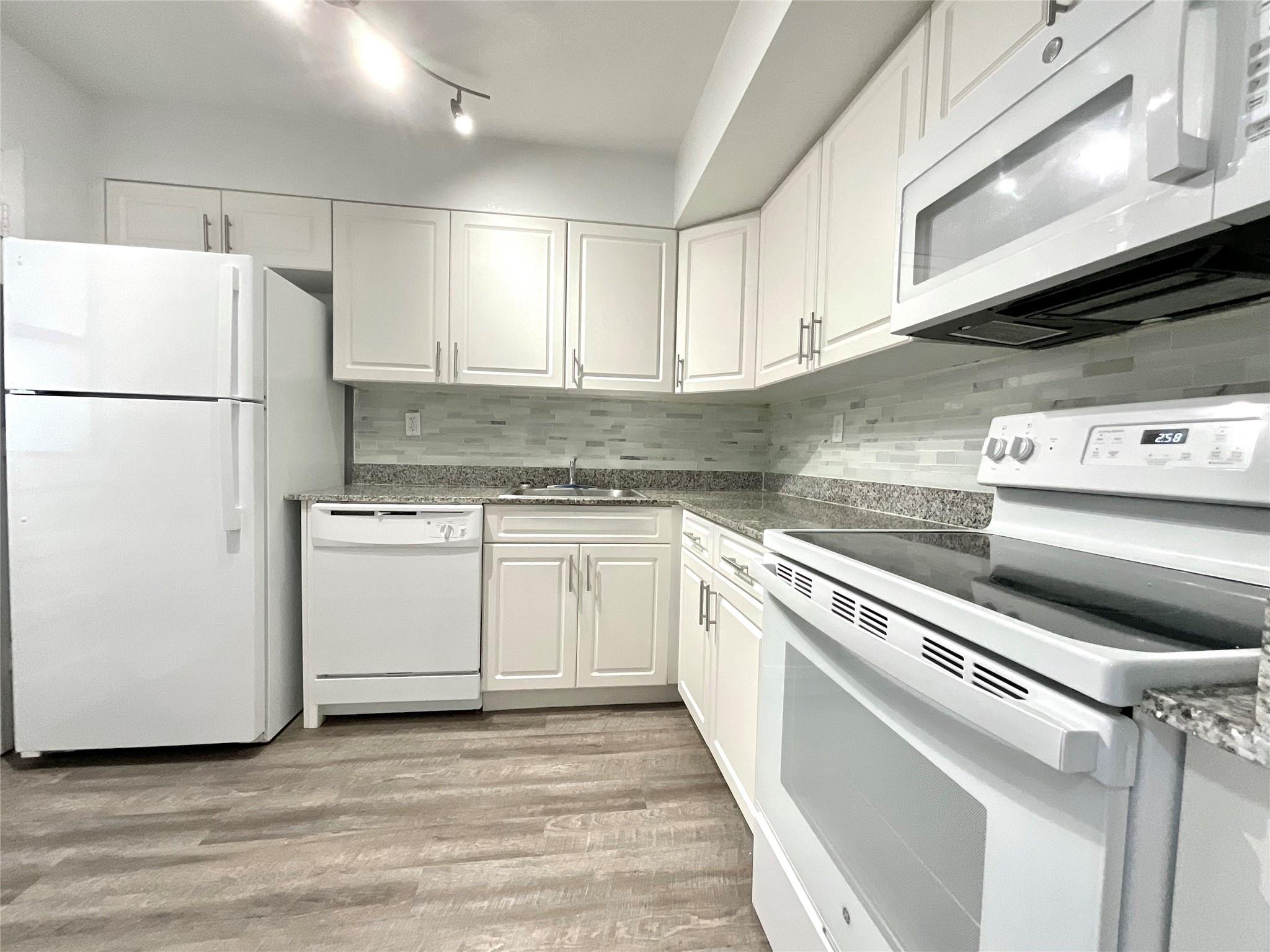 9357 SW 77th Ave #65-407