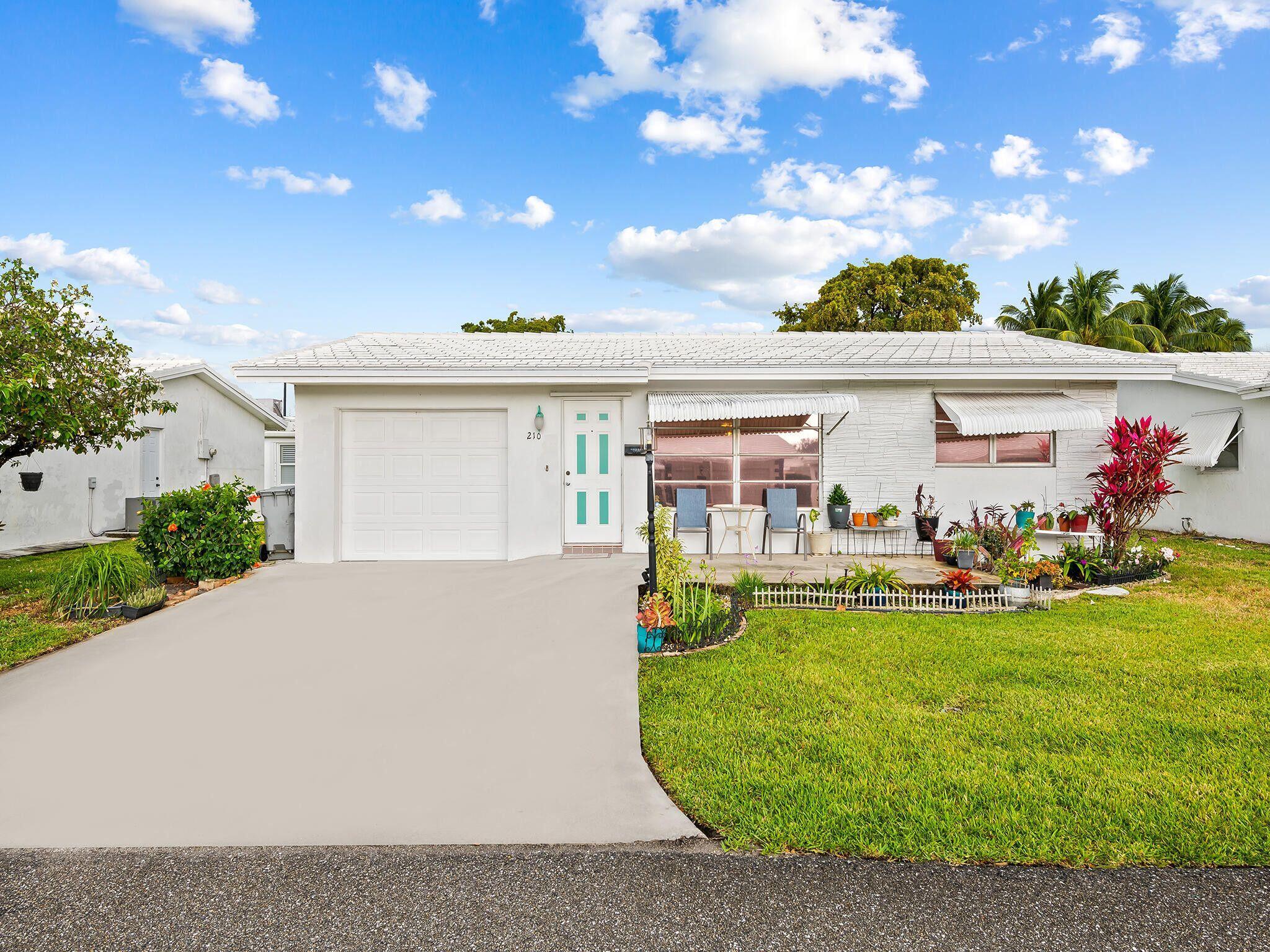 210 NW 25th Ct