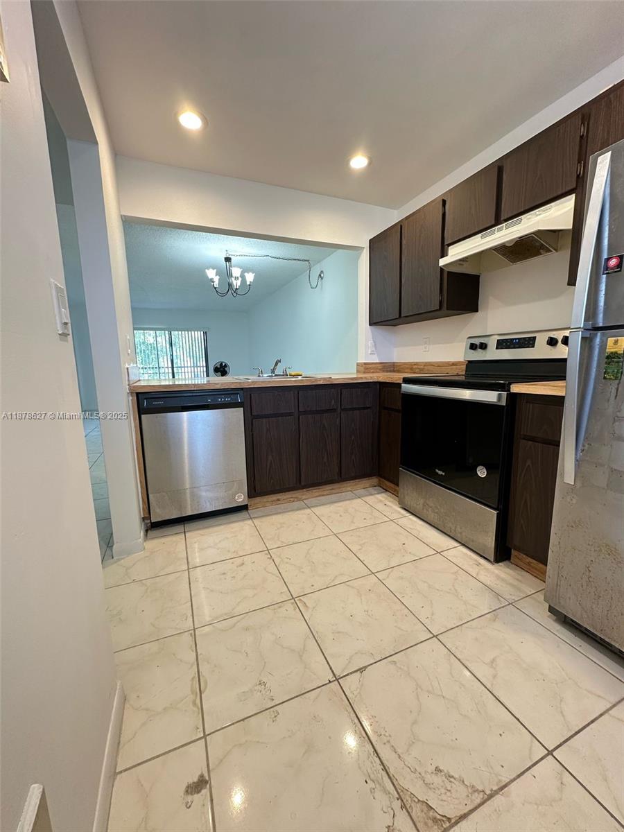 861 NE 209th Ter #203