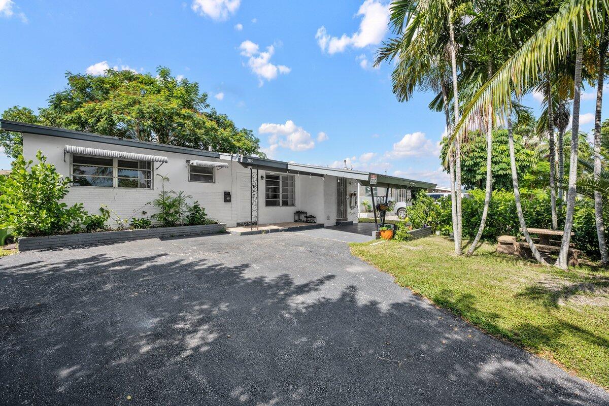 309 SW 7th St