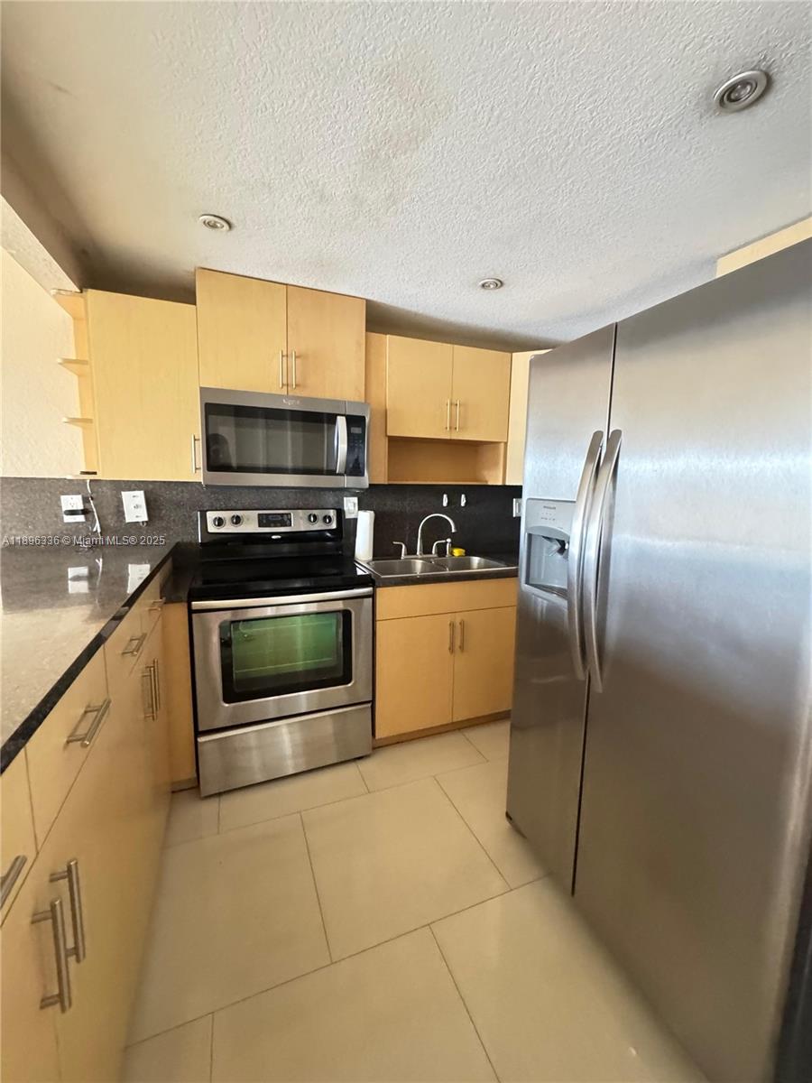 6095 W 19th Ave #407