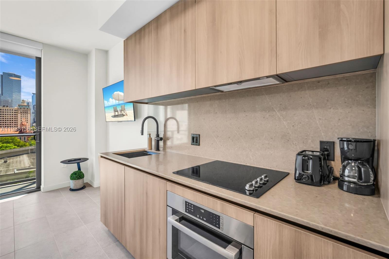 121 NE 5th St #902 Miami, FL 33132