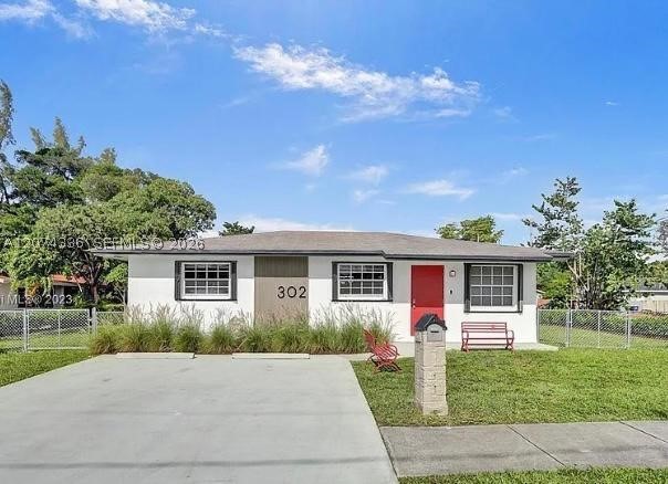 302 NW 9th St