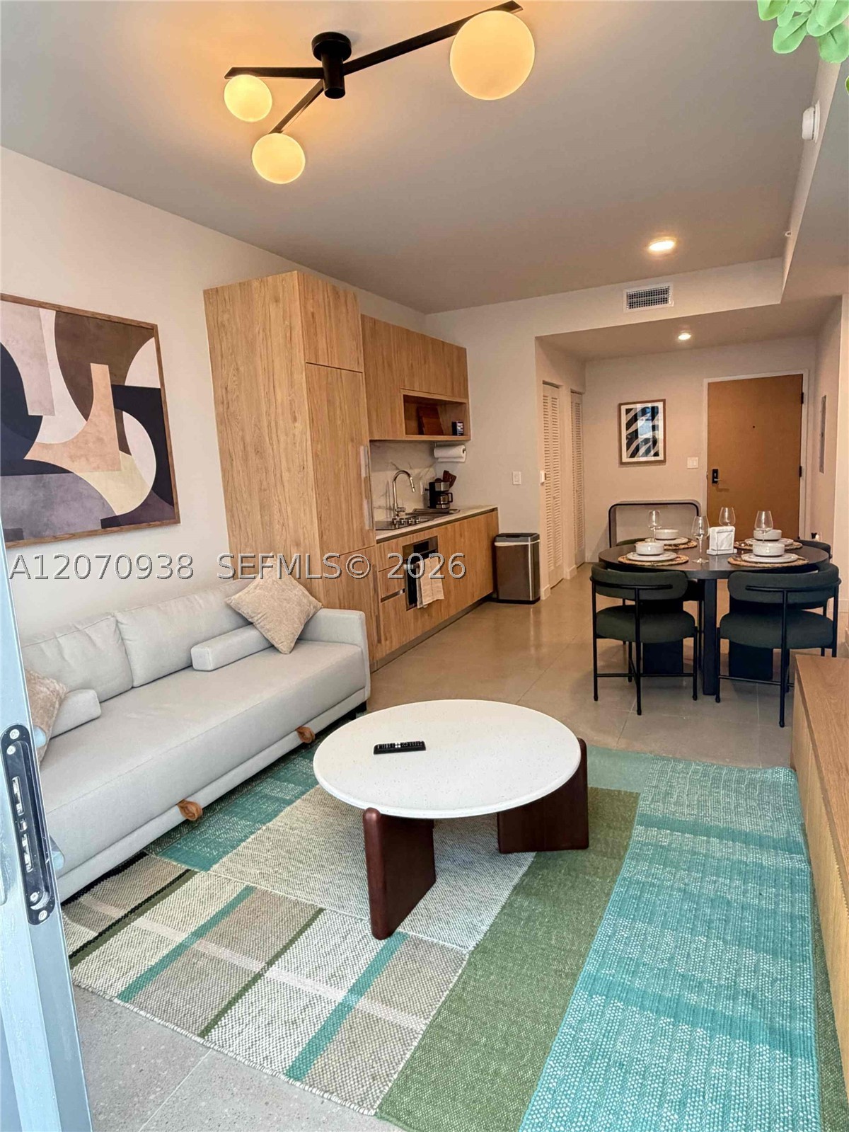 11 NE 6th St #705