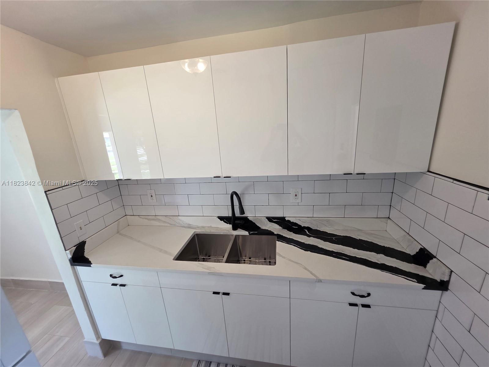 120 NE 10th Ave #3