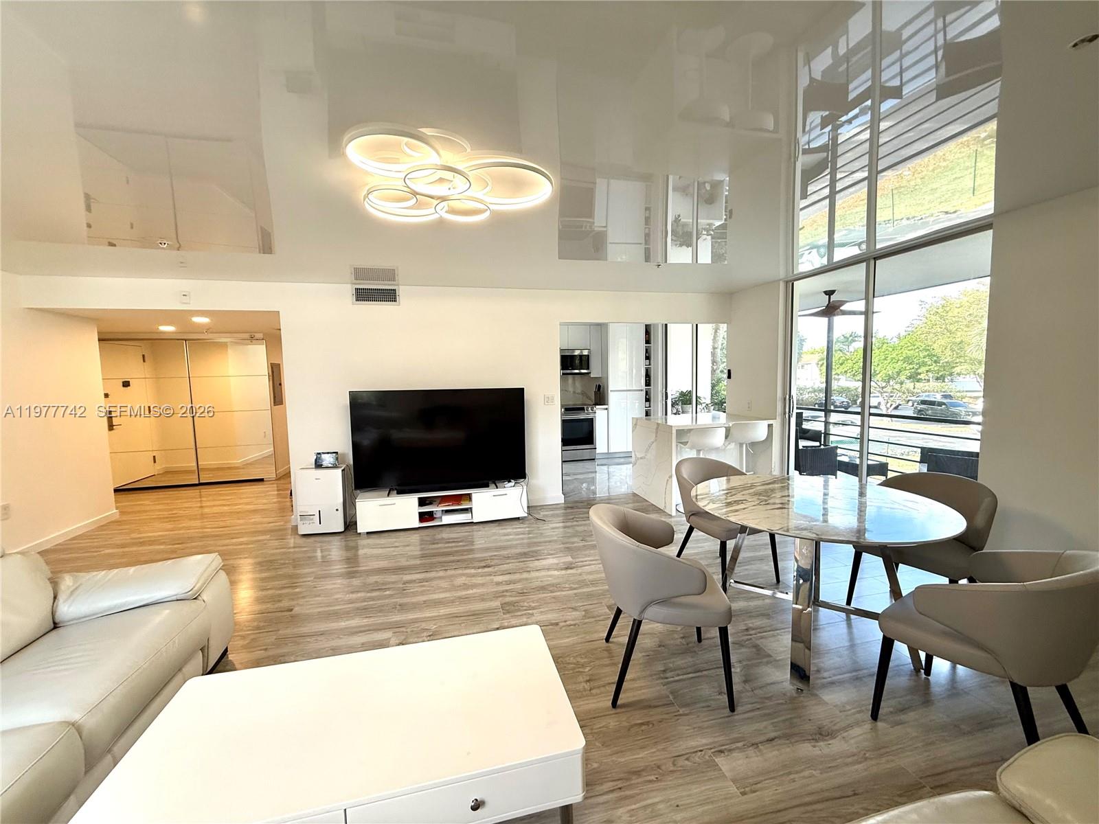 671 NE 195th St #205E