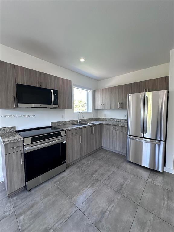 165 NW 39th St #7 Miami, FL 33127