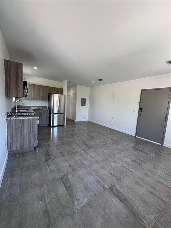 165 NW 39th St #7 Miami, FL 33127