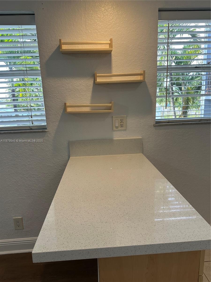 110 SE 2nd St #203