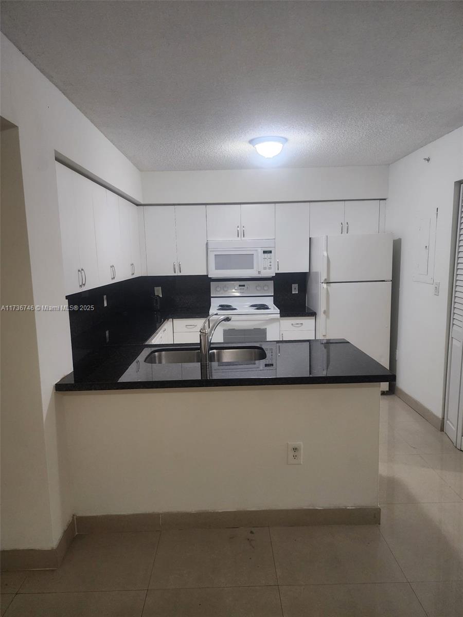 4560 NW 107th Ave #207-12