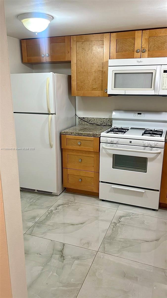 18111 NW 68th Ave #H210