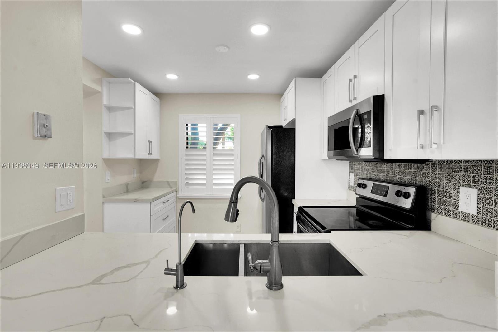 10401 W Broward Blvd #205