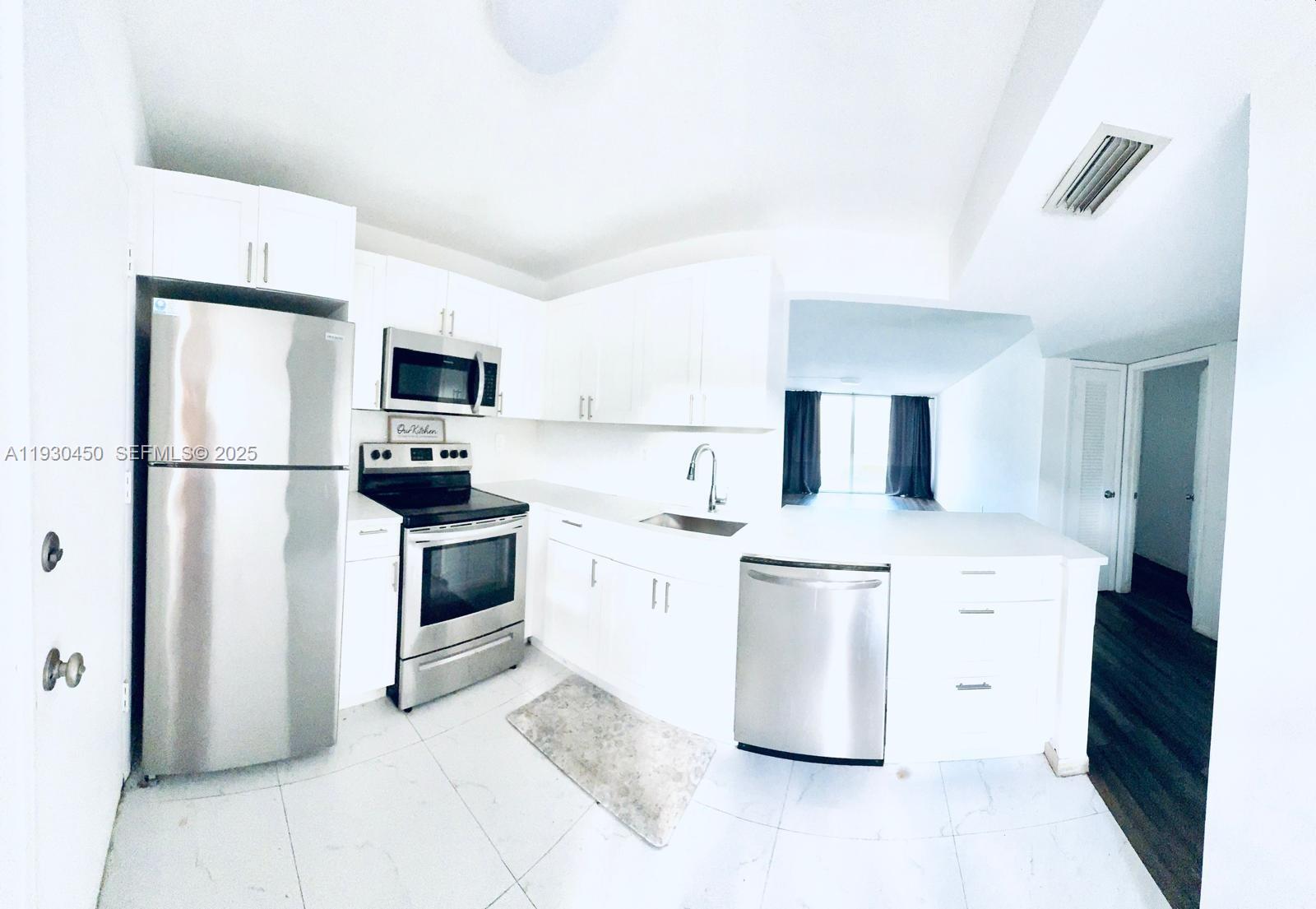 1401 NE 191st St #D207