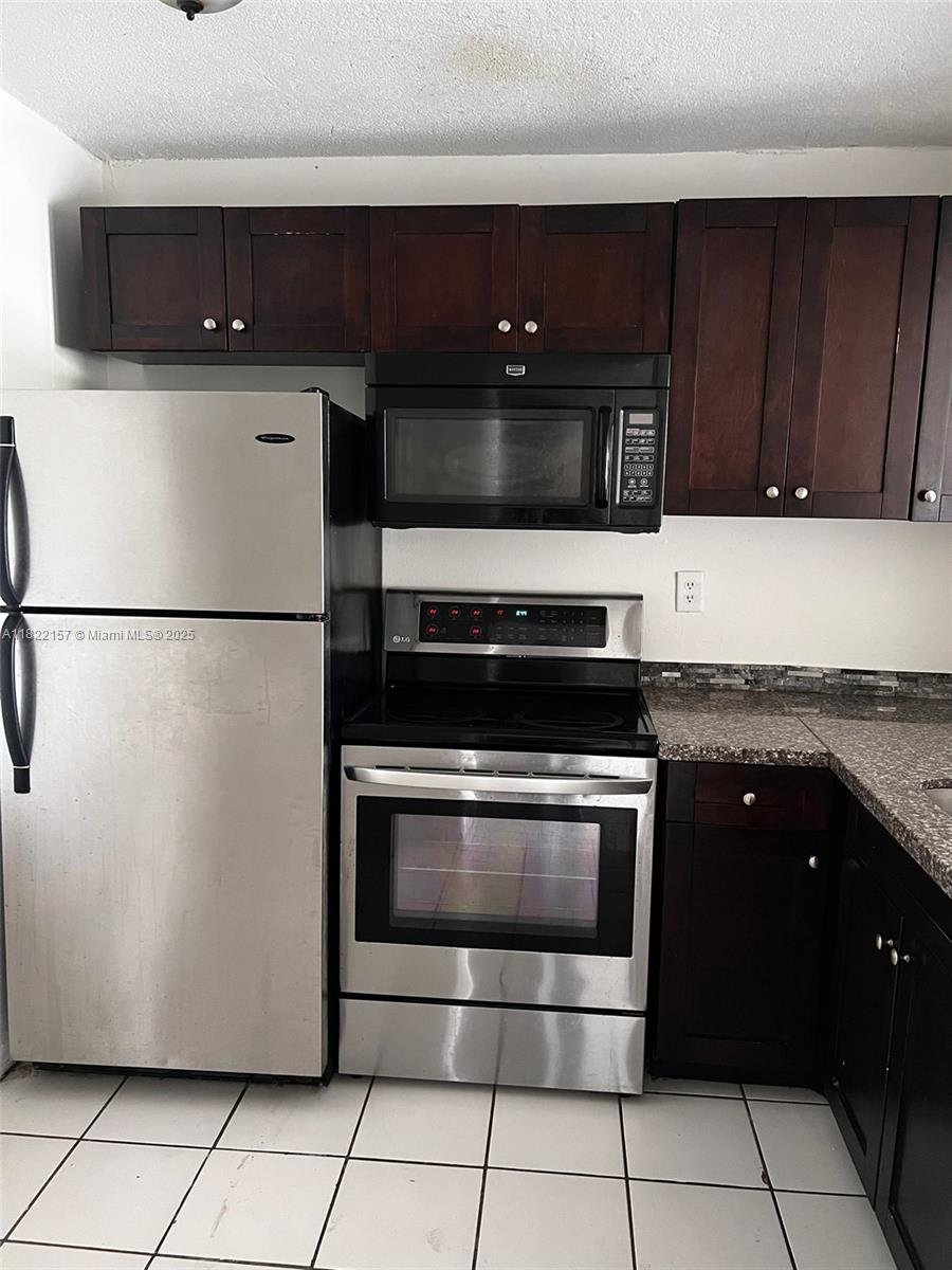 498 NW 165th St Rd #D303