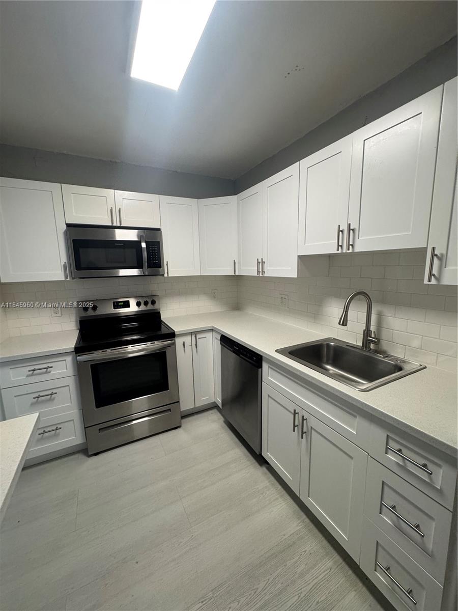 1475 NE 125th Ter #208H