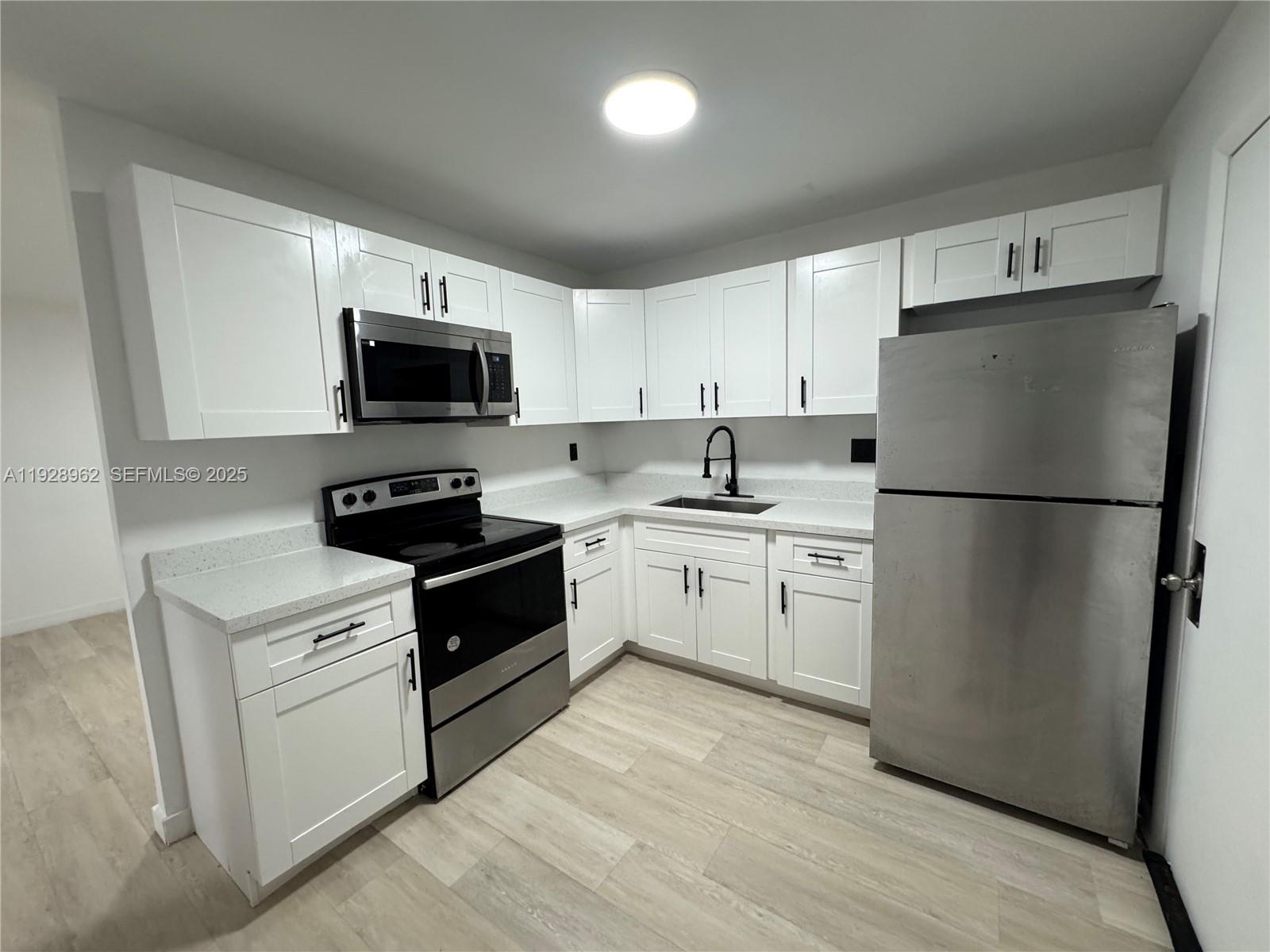 12215 W Dixie Hwy #103