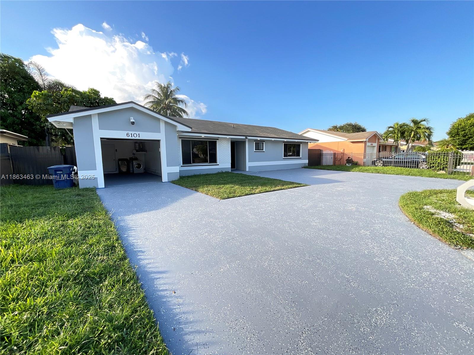 6101 NW 199th St