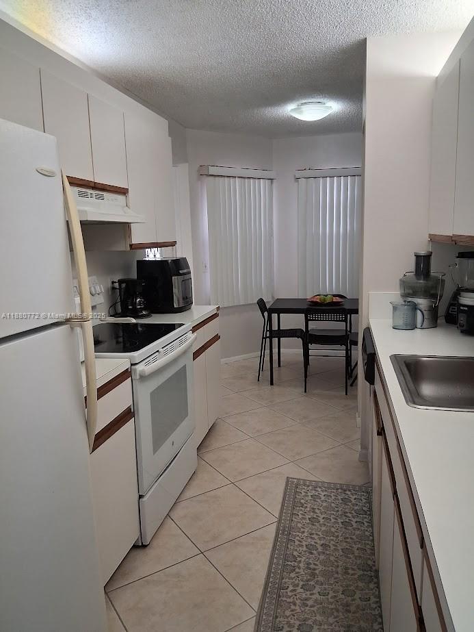 1100 SW 128th Ter #207U