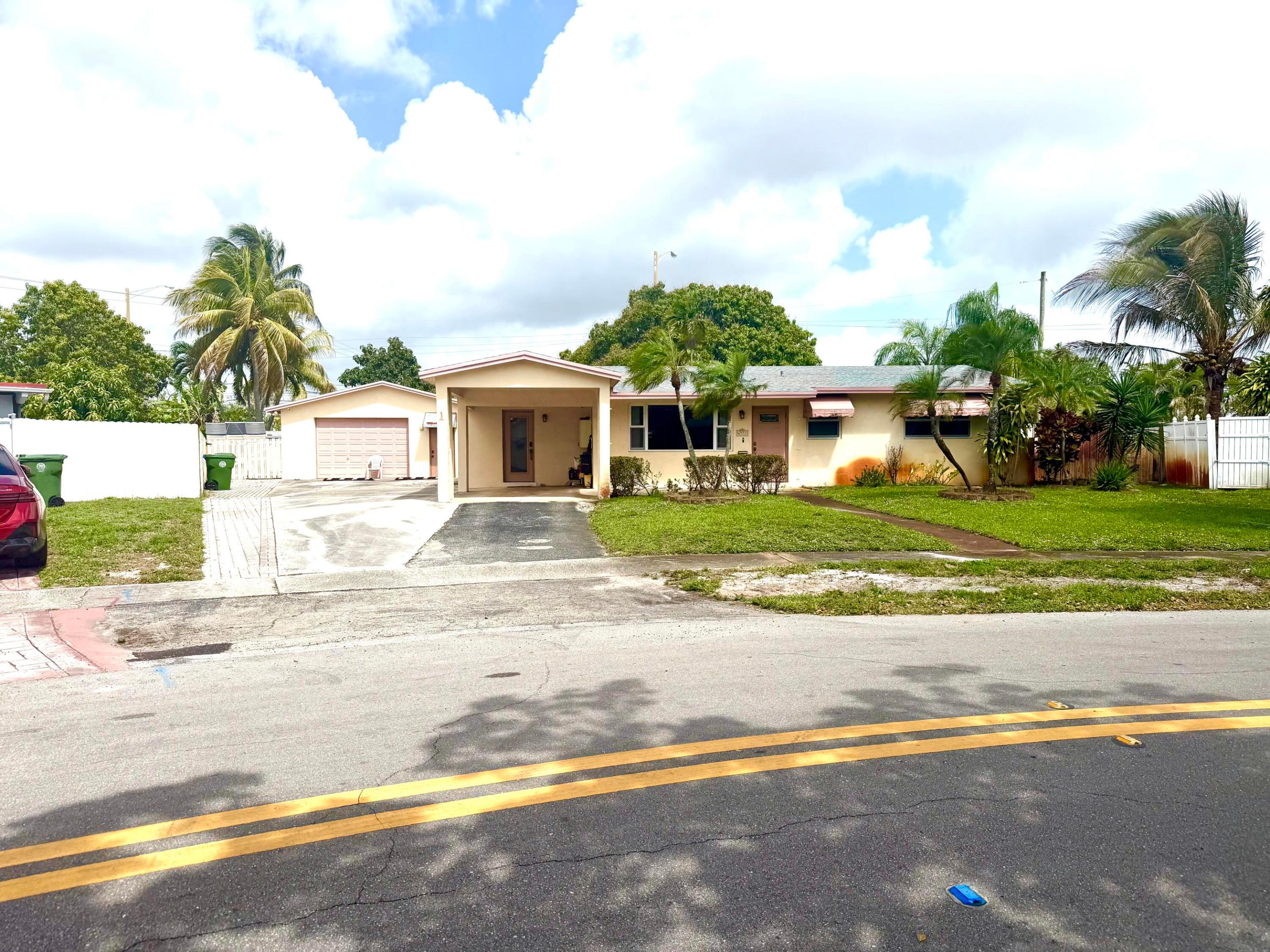 6971 SW 1st