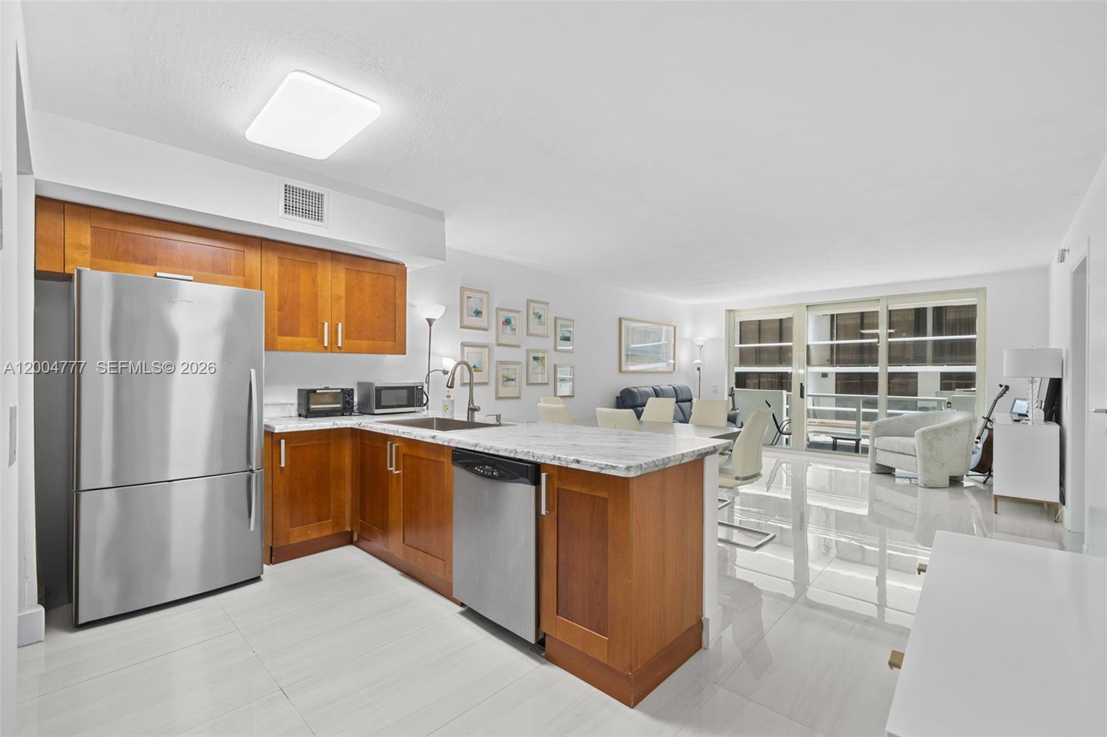 9499 Collins Ave #207