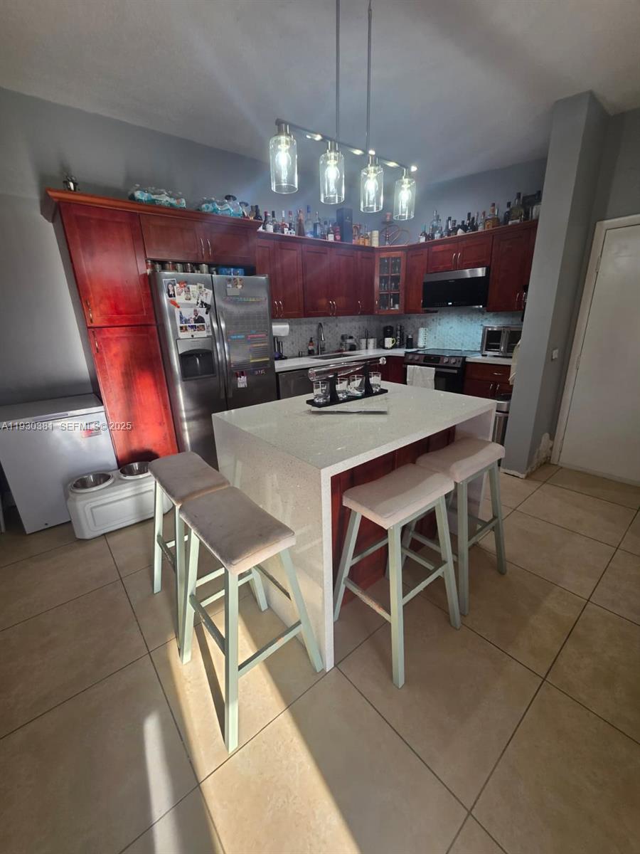 9727 Hammocks Blvd #207D