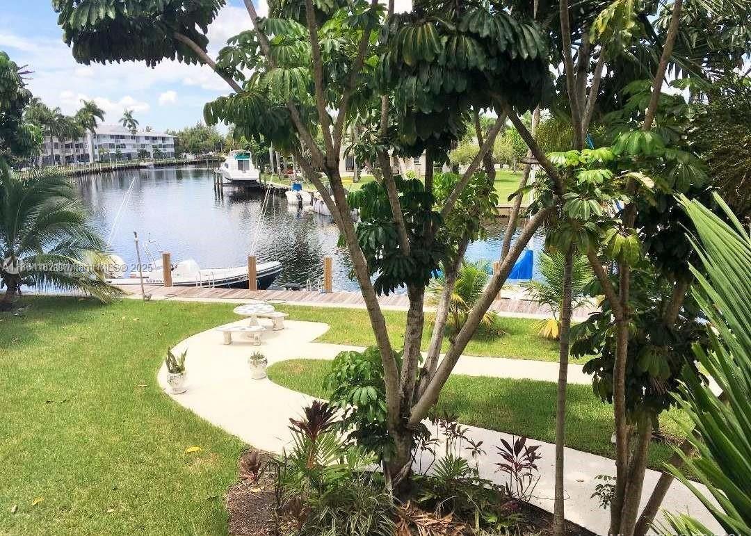 455 Golden Isles Dr #203