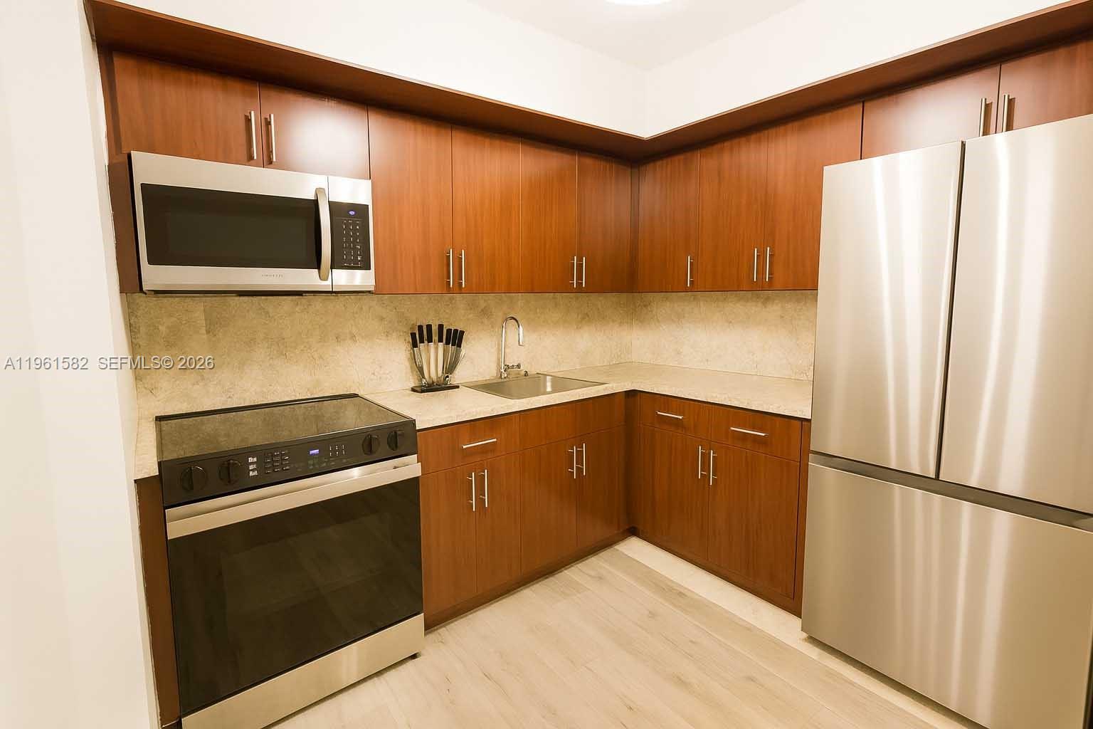 921 NE 199th St #107 Miami, FL 33179