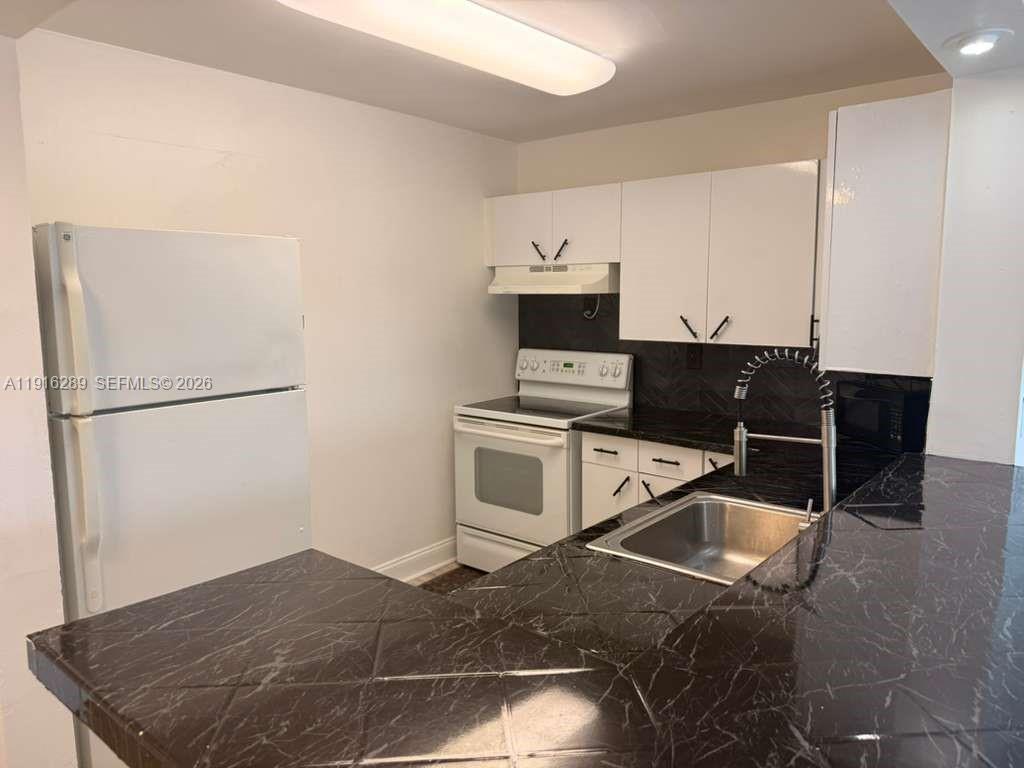 5201 NW 7th St #405 Miami, FL 33126