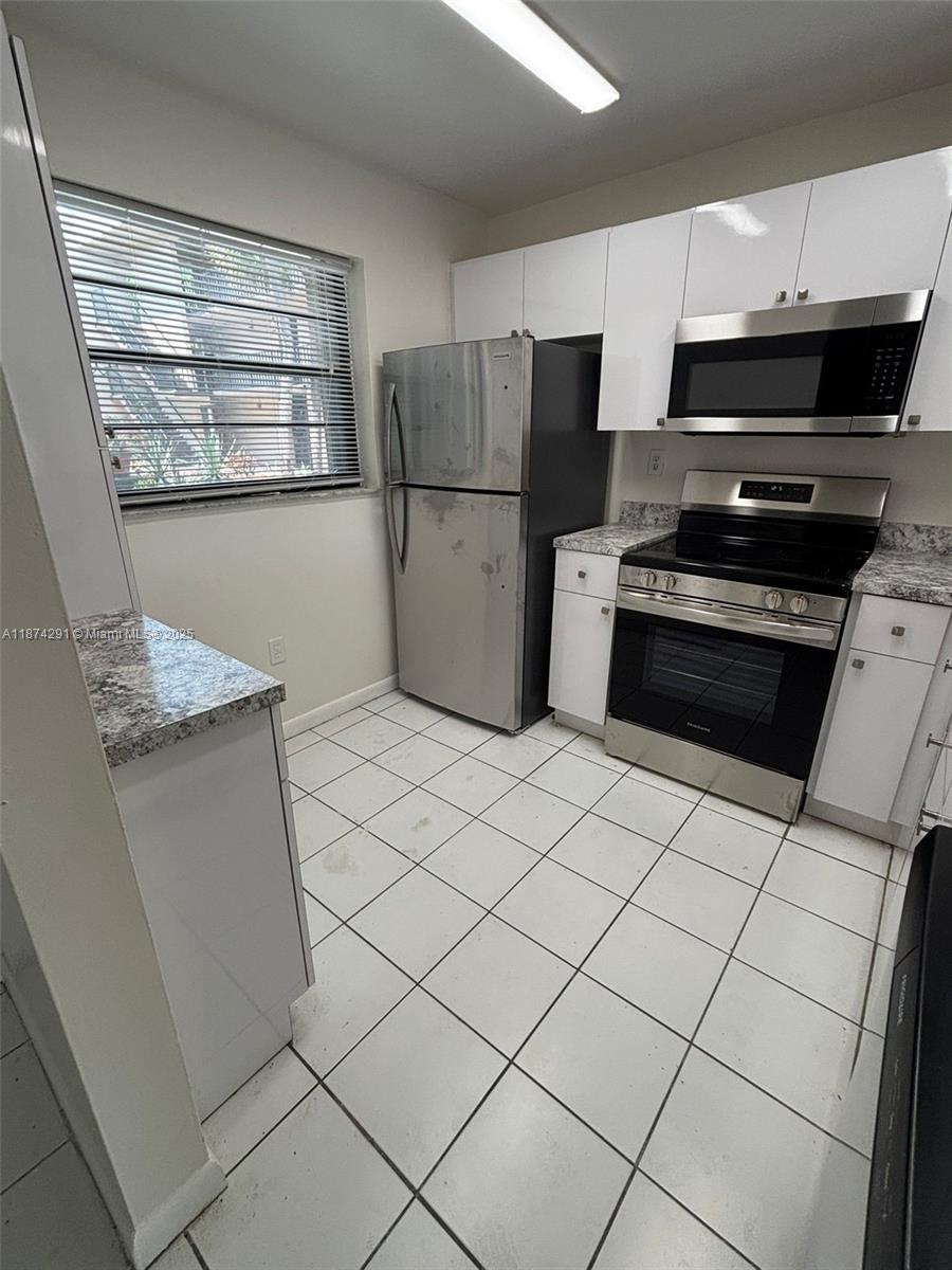 10865 SW 112th Ave #115