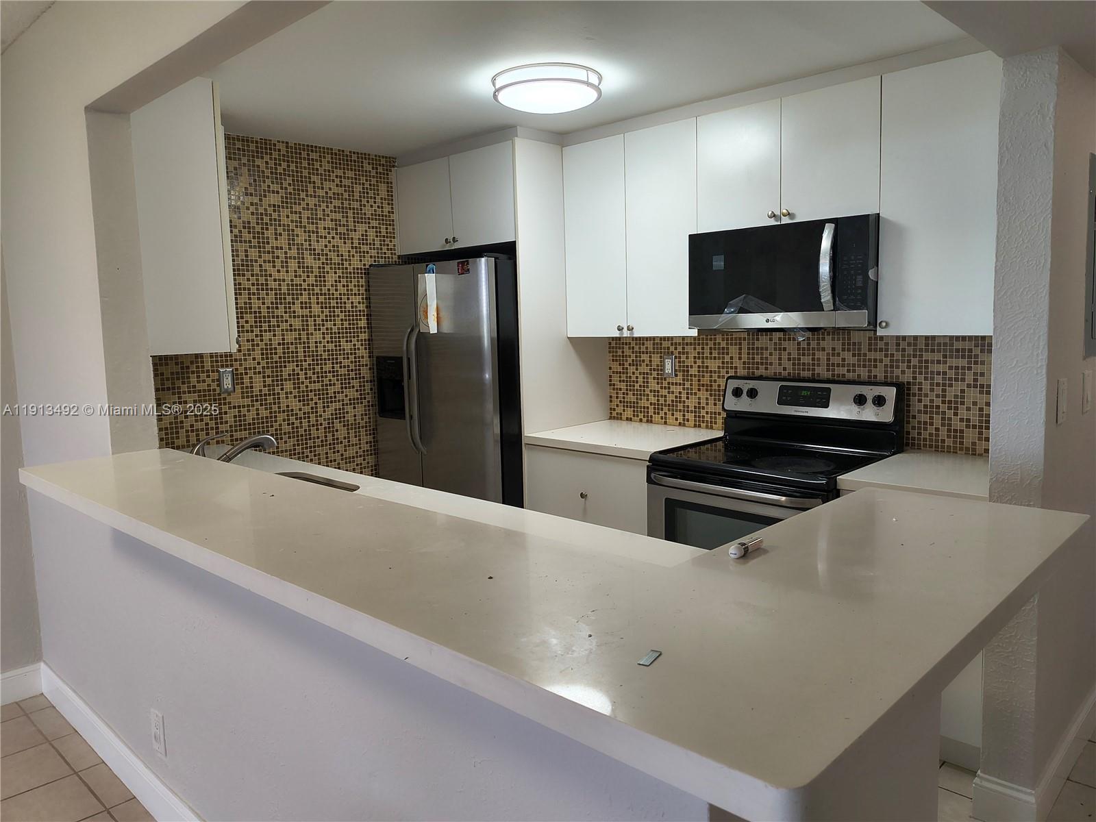 9143 SW 77th Ave #B702