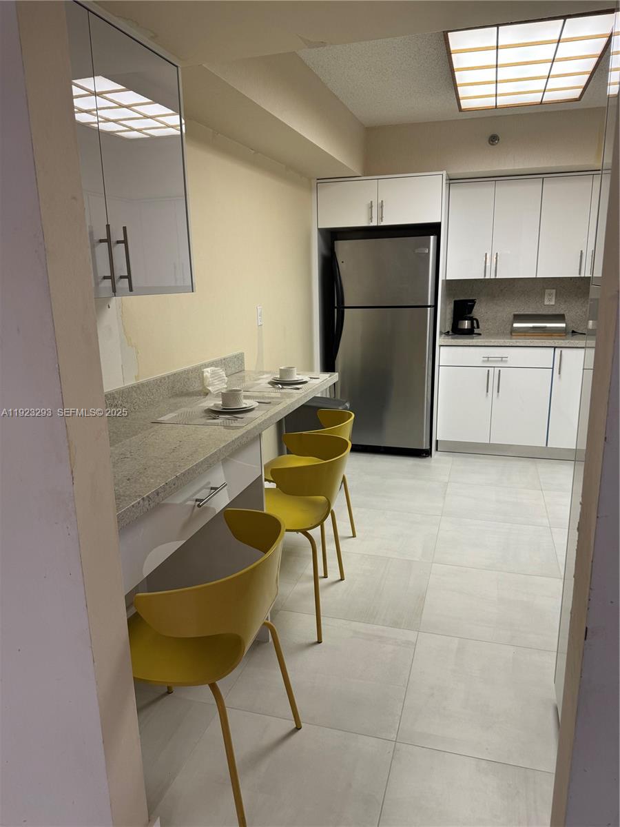 3600 Mystic Pointe Dr #208