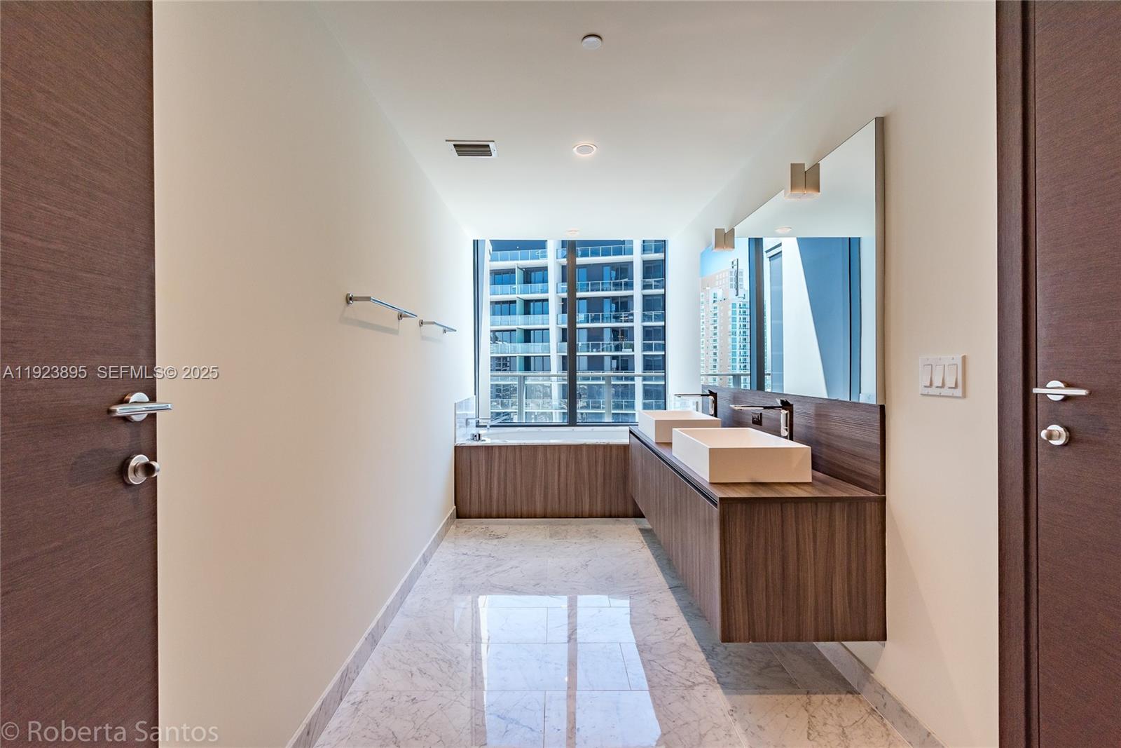 1000 Brickell Plz #2009 Miami, FL 33131
