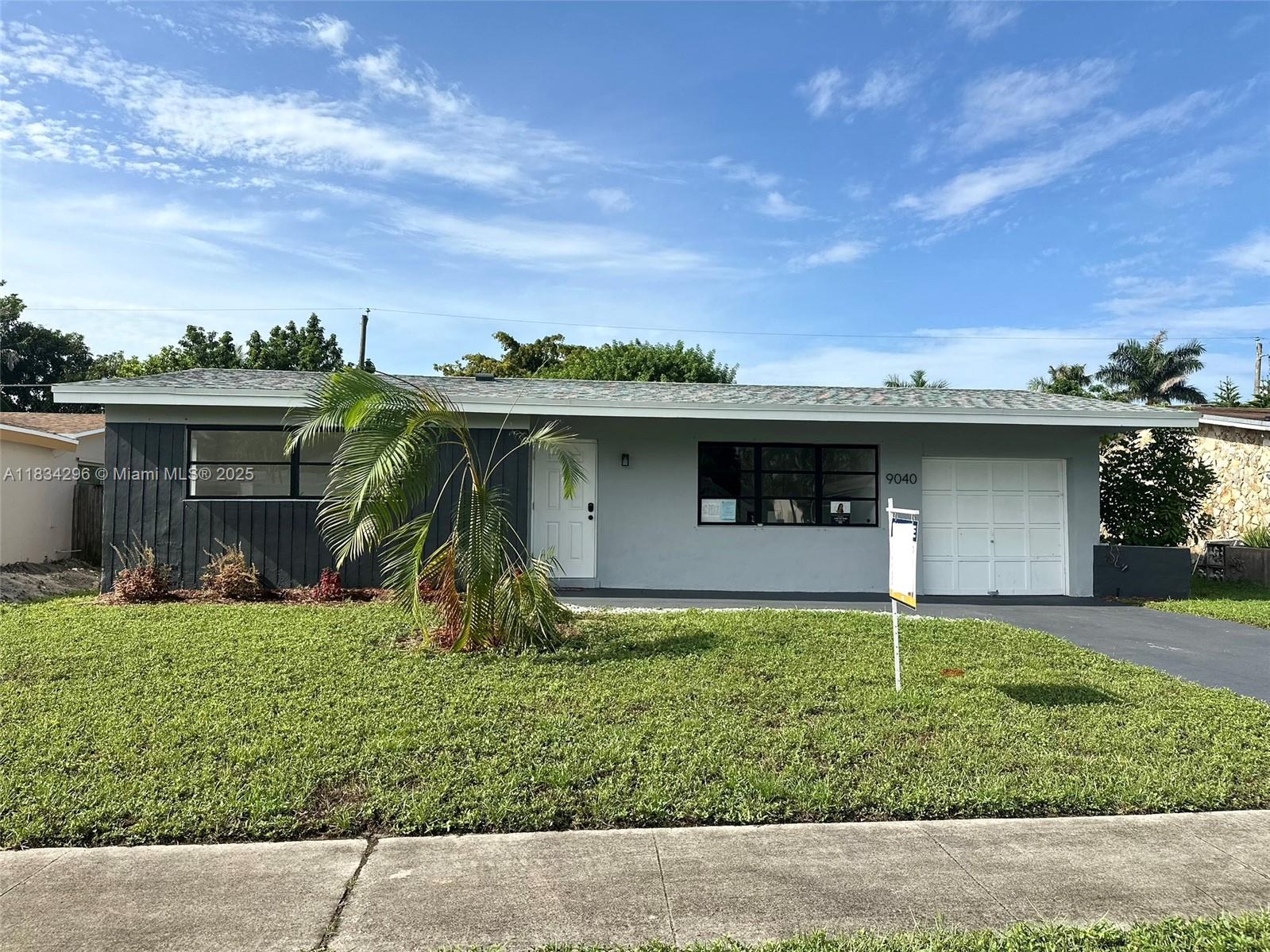 9040 NW 26th Pl Sunrise Golf Vlg