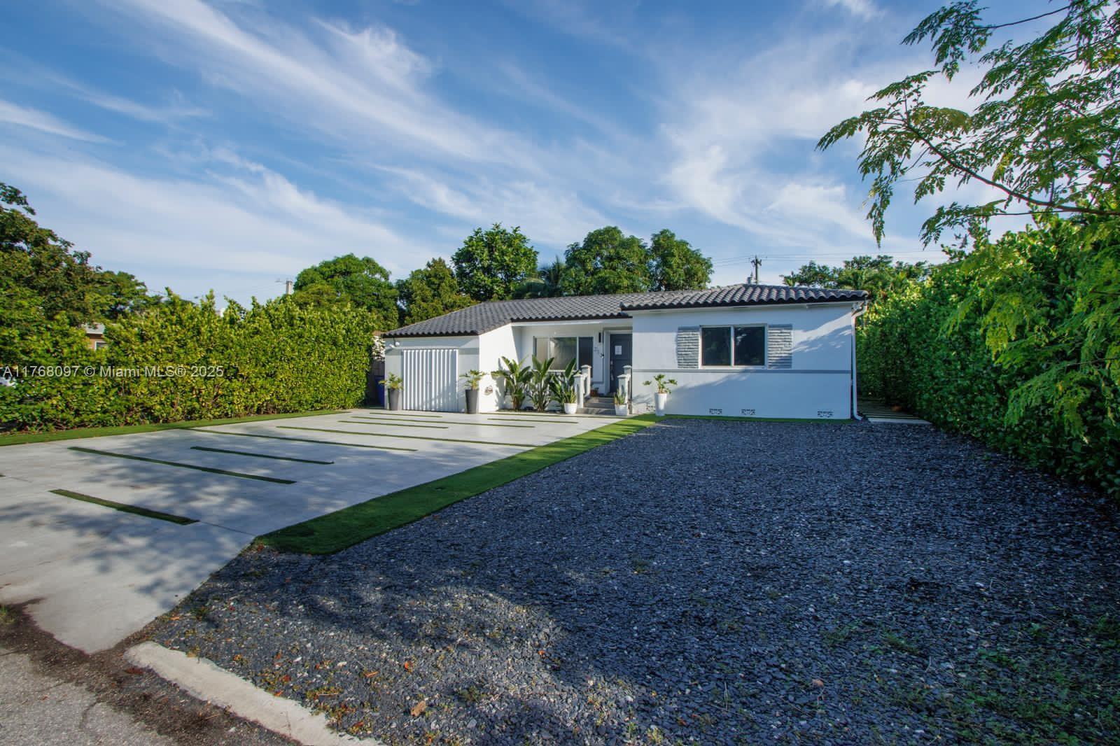 213 NE 43rd St